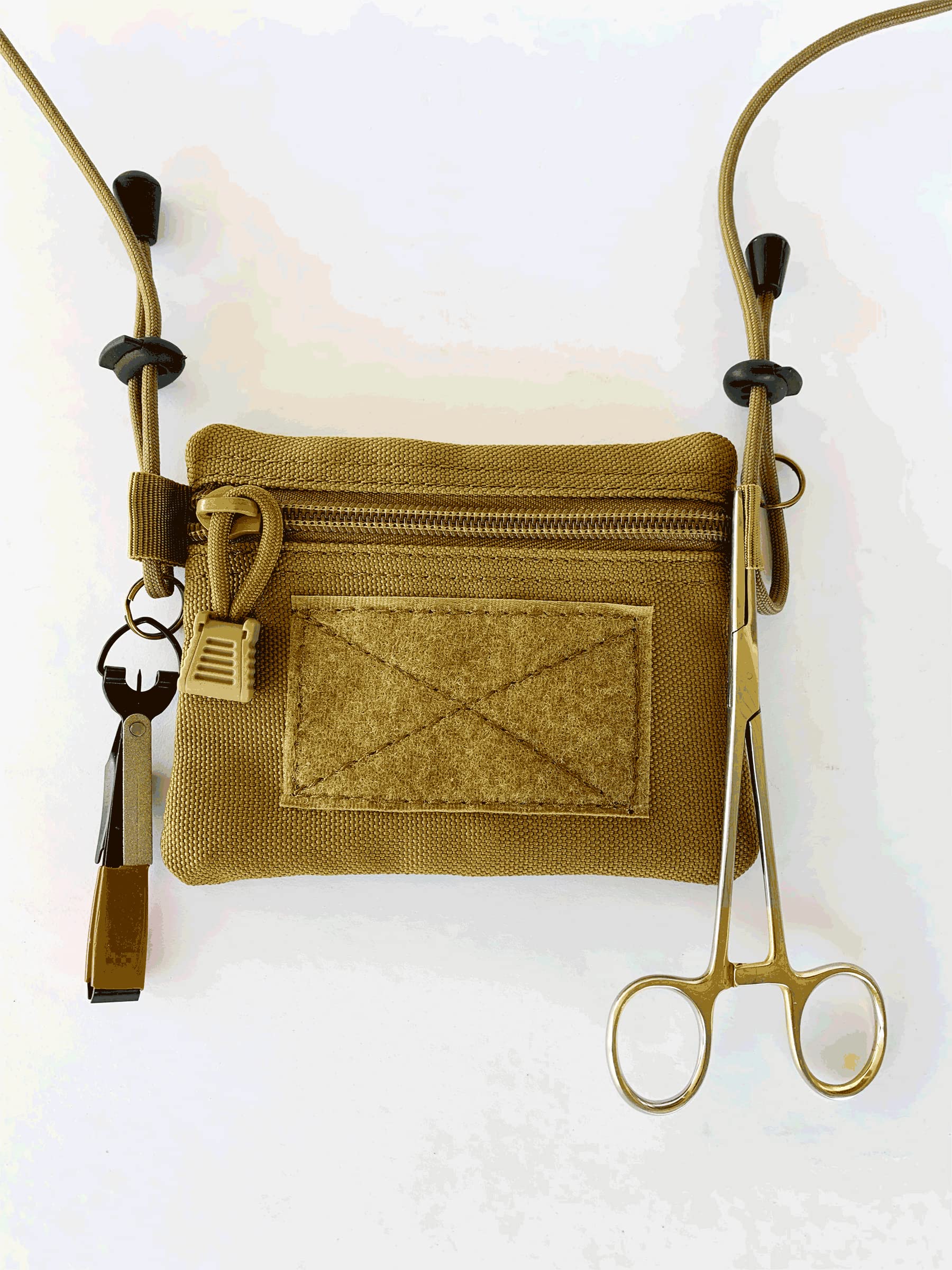 River Canyon - Pouch Lanyard with Nippers - This Fly Fishing Lanyard has a Water-Resistant Zipper Pouch, Nippers are Also Included. There is a Loop to Hang Your hemostat. Two More Rings to Hang Tools