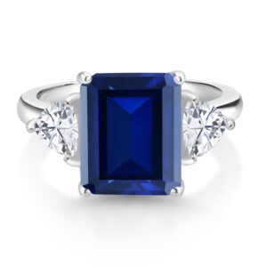 Gem Stone King 925 Sterling Silver Blue Created Sapphire 3 Stone Engagement Ring For Women (5.54 Cttw, Emerald Cut 12X10MM, Trillion 5MM, Available In Size 5, 6, 7, 8, 9)