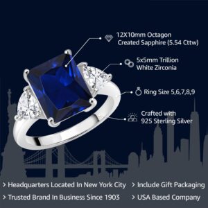 Gem Stone King 925 Sterling Silver Blue Created Sapphire 3 Stone Engagement Ring For Women (5.54 Cttw, Emerald Cut 12X10MM, Trillion 5MM, Available In Size 5, 6, 7, 8, 9)