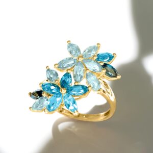 Ross-Simons 3.70 ct. t.w. Tonal Blue Topaz Floral Ring in 18kt Gold Over Sterling. Size 7