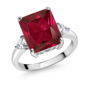 Gem Stone King 925 Sterling Silver Red Created Ruby and White Moissanite 3 Stone Ring For Women (6.02 Cttw, Emerald Cut 12X10MM, Trillion 3.5MM, Available In Size 5, 6, 7, 8, 9)