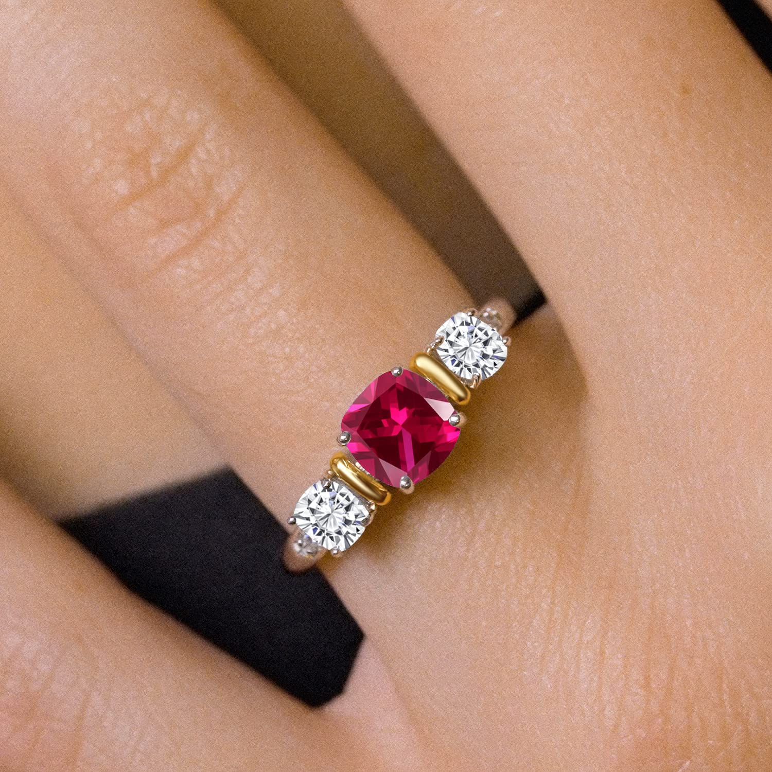 Gem Stone King 925 Sterling Silver and 10K Yellow Gold Red Created Ruby and White Moissanite 3 Stone Engagement Ring For Women (1.64 Cttw, Cushion Cut 6MM and 4MM, Available In Size 5, 6, 7, 8, 9)