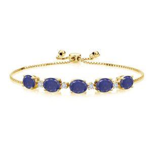 Gem Stone King 18K Yellow Gold Plated Silver Oval Blue Lapis and White Moissanite Tennis Bracelet For Women (7.26 Cttw, Fully Adjustable Up to 9 Inch)