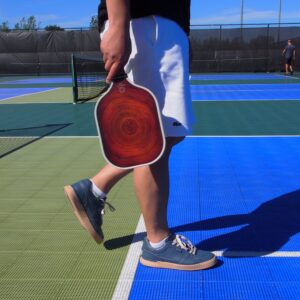 A. Anbrose Pickleball Paddle Set (Walnut) | Comfort Cushion Grip | Long Handle | Fiberglass | Polypropylene Honeycomb Core | 2 Racquets | 4 Pickleballs(2 Indoor 2 Outdoor) | 1 Portable Bag