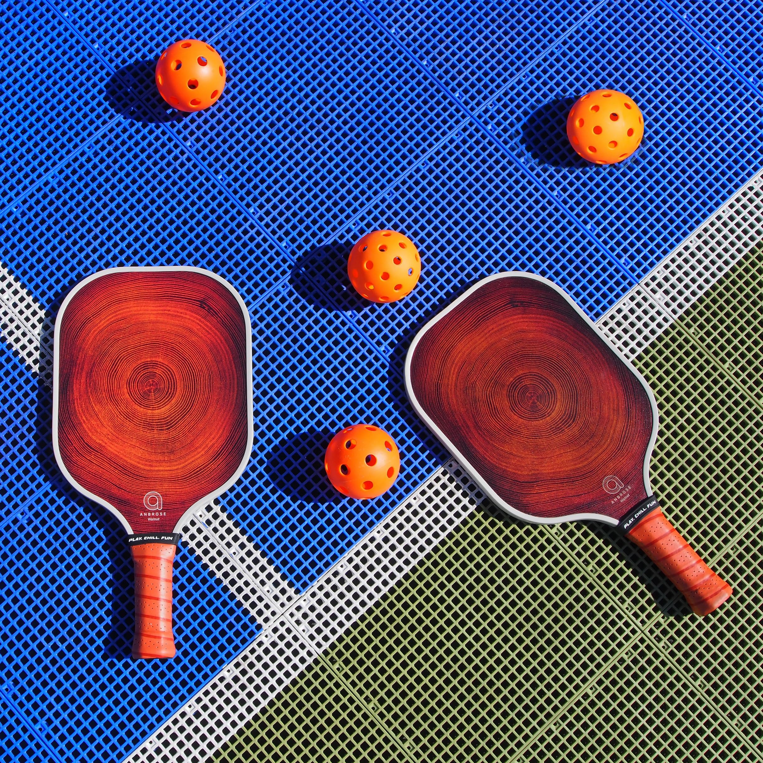 A. Anbrose Pickleball Paddle Set (Walnut) | Comfort Cushion Grip | Long Handle | Fiberglass | Polypropylene Honeycomb Core | 2 Racquets | 4 Pickleballs(2 Indoor 2 Outdoor) | 1 Portable Bag