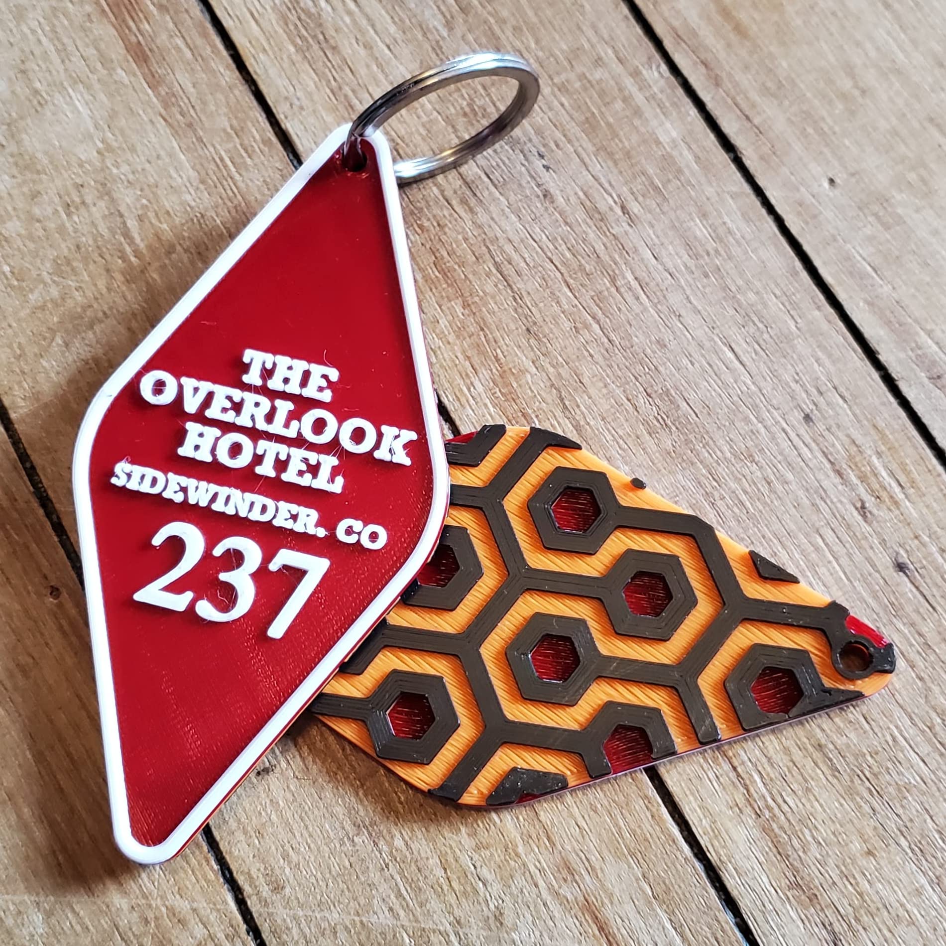 Room 237 Hexagon keychain from the Overlook Hotel in The Shining, Red, Orange, Black, White