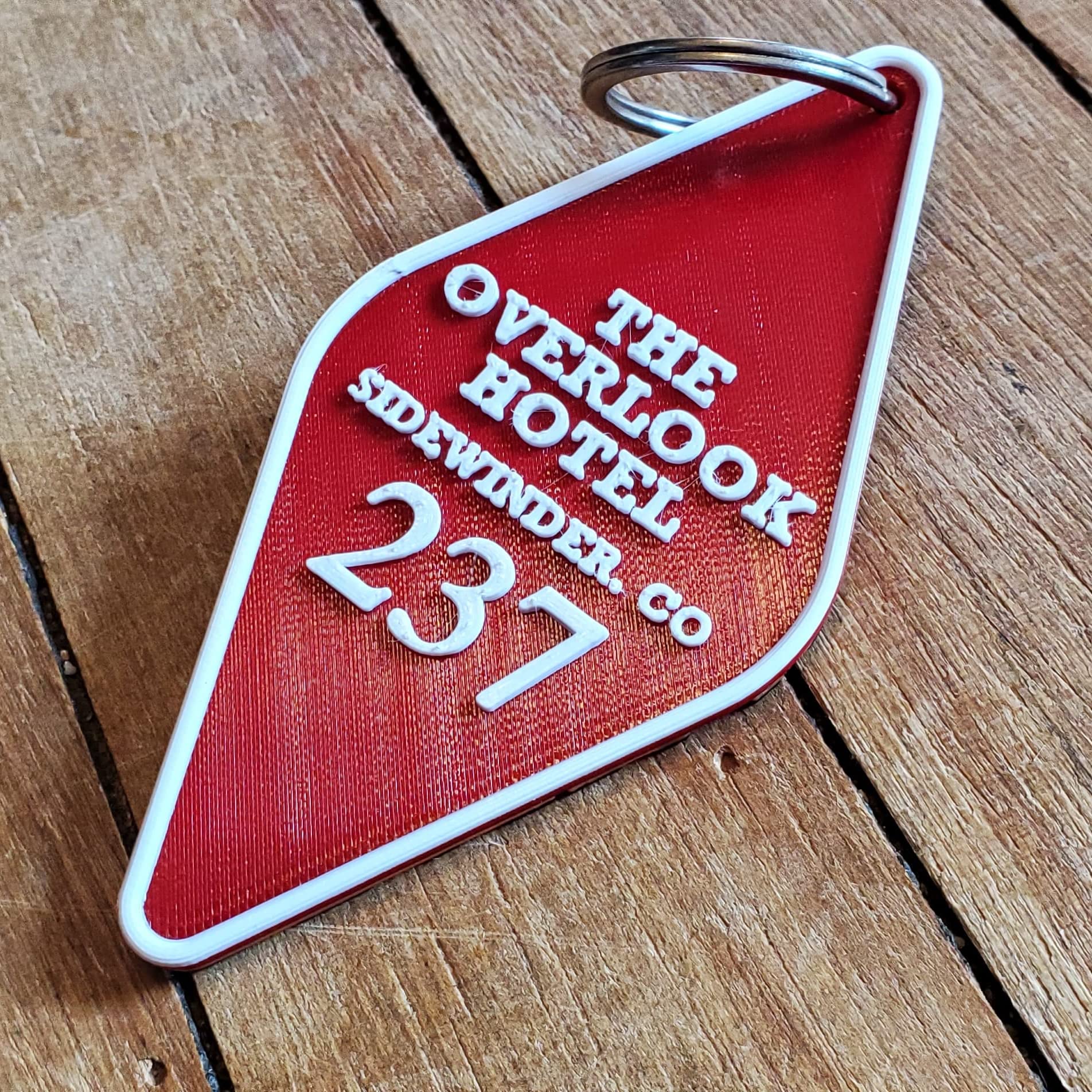 Room 237 Hexagon keychain from the Overlook Hotel in The Shining, Red, Orange, Black, White