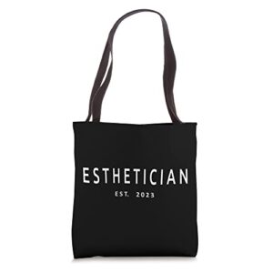 esthetician est. 2023, new skin care specialist, graduation tote bag