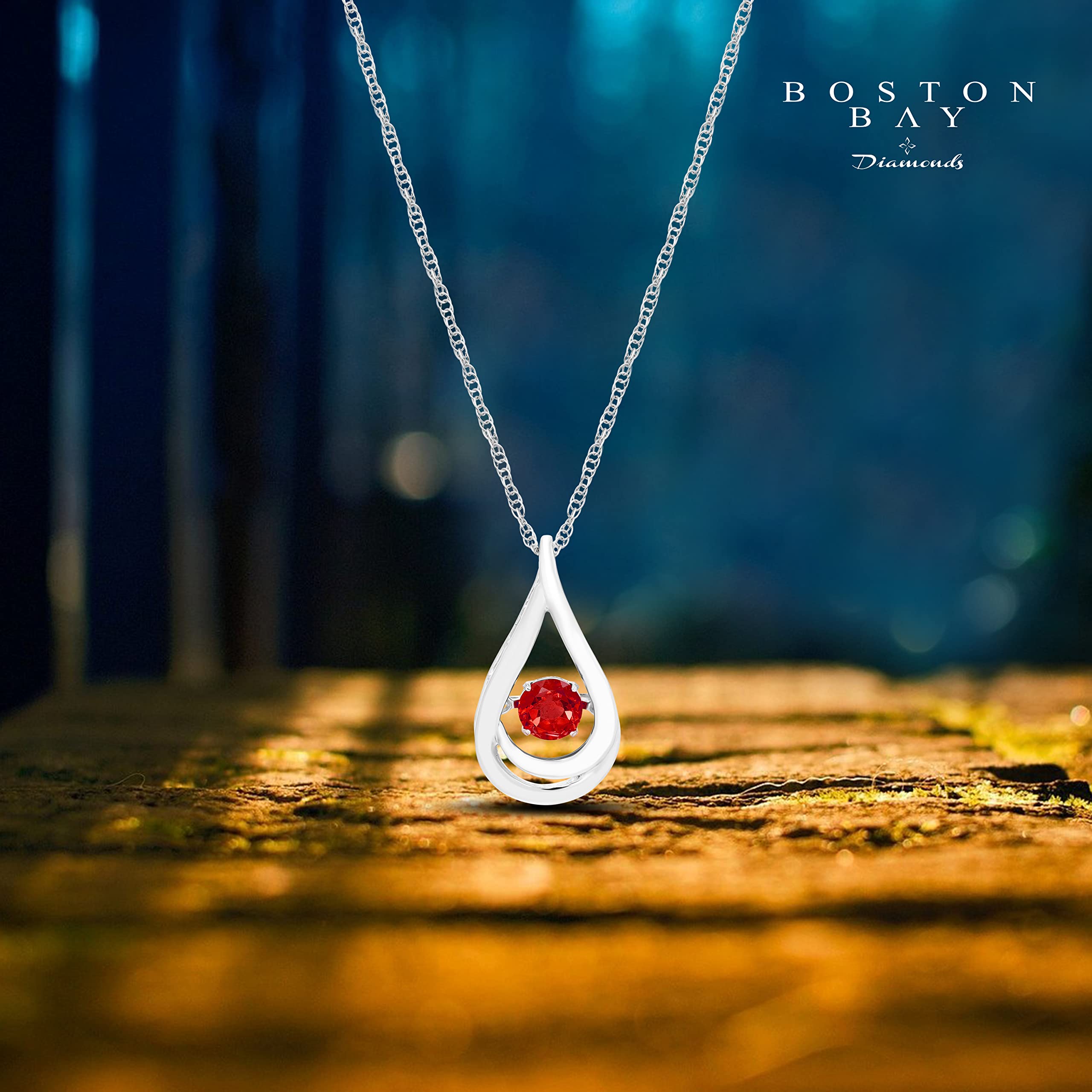 Created Ruby Open Teardrop with Dancing Gemstone Brilliance in Motion Sterling Silver Pendant Necklace with Rope Chain - 18”