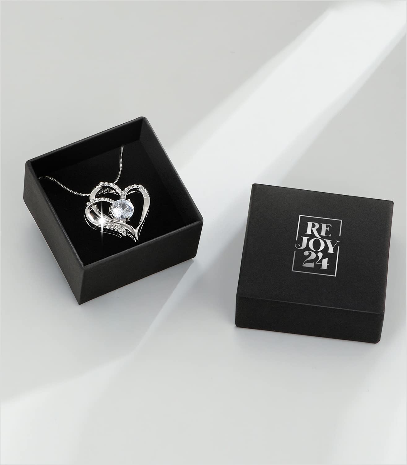 REJOY24 Heart Pendant Goodluck Necklace made of Brass, Platinum Plated coating with Shiny Rhinestone (Box included)