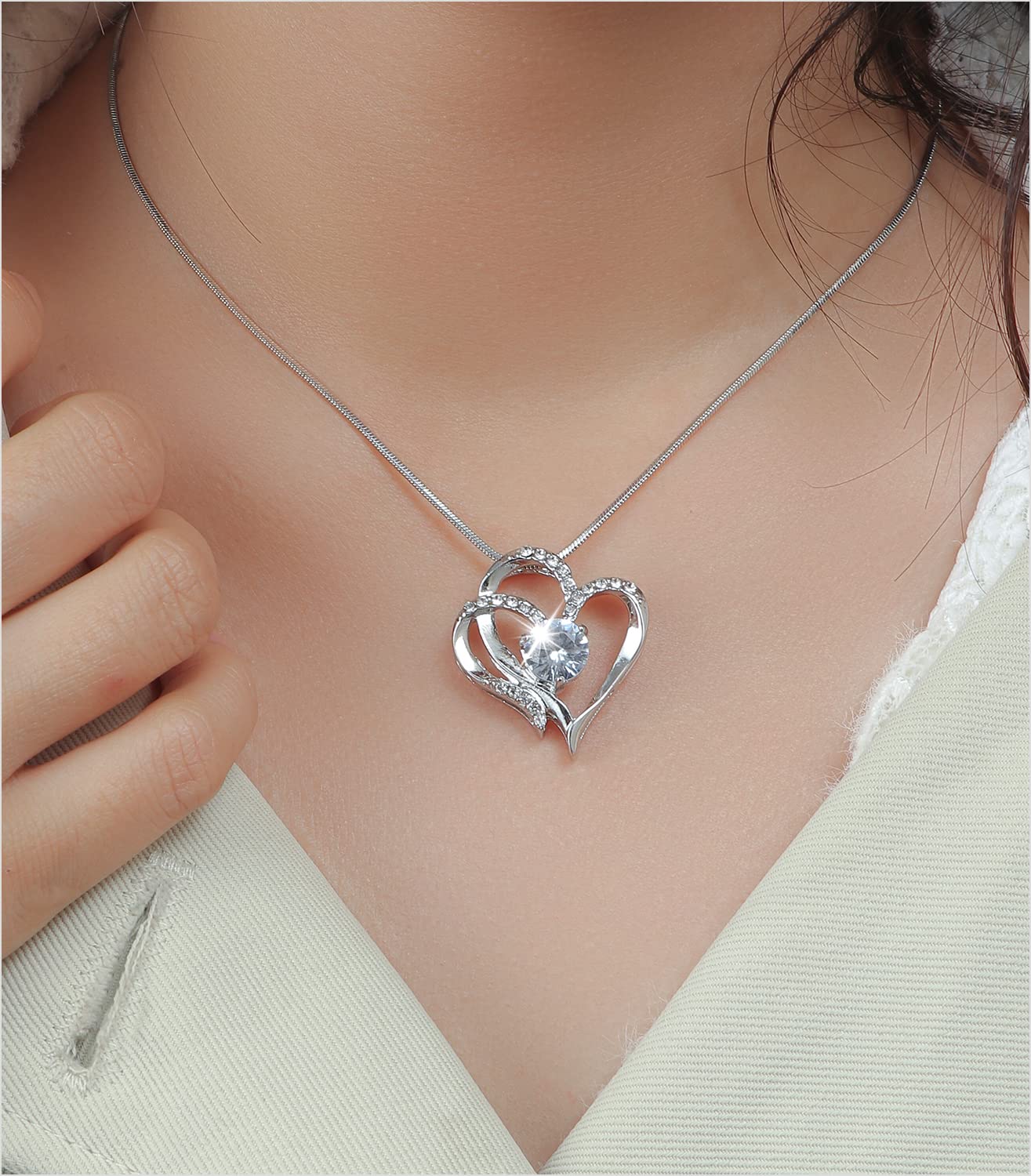 REJOY24 Heart Pendant Goodluck Necklace made of Brass, Platinum Plated coating with Shiny Rhinestone (Box included)