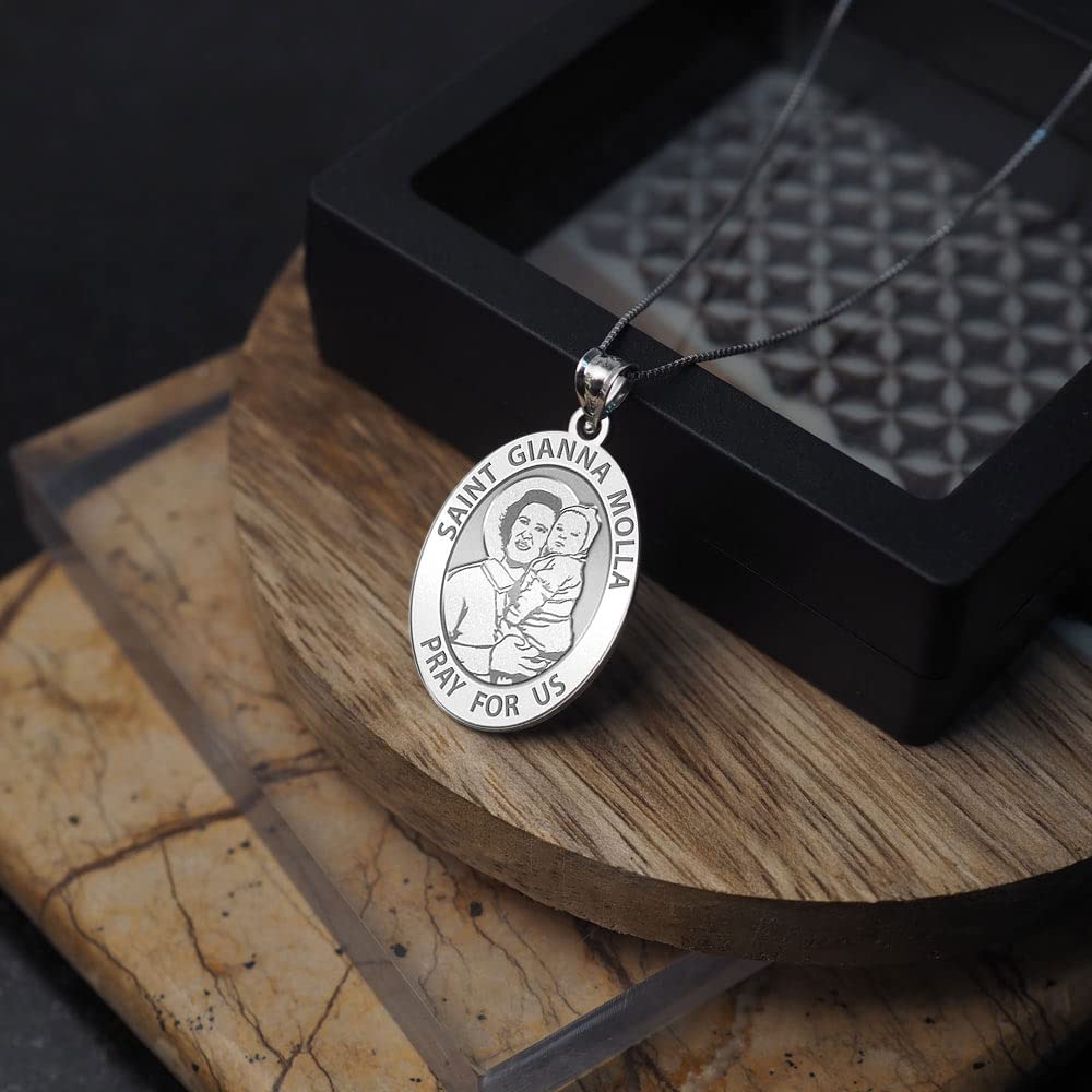 PicturesOnGold.com Saint Gianna Beretta Molla Oval Religious Medal - 2/3 X 3/4 Inch Size of Nickel, Sterling Silver with Engraving