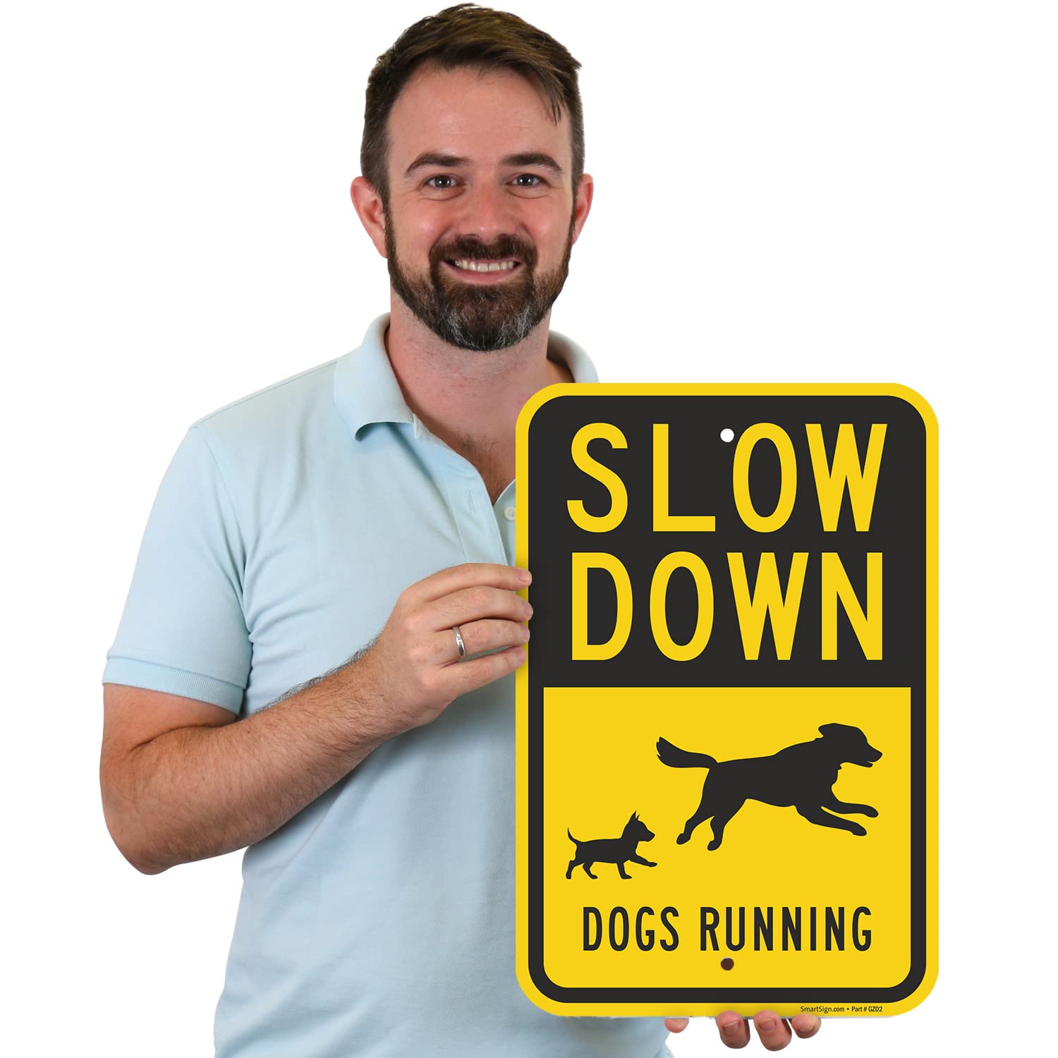 SmartSign 18 x 12 inch “Slow Down - Dogs Running” Metal Sign with Symbols, 63 mil Laminated Rustproof Aluminum, Black and Yellow, Made in USA