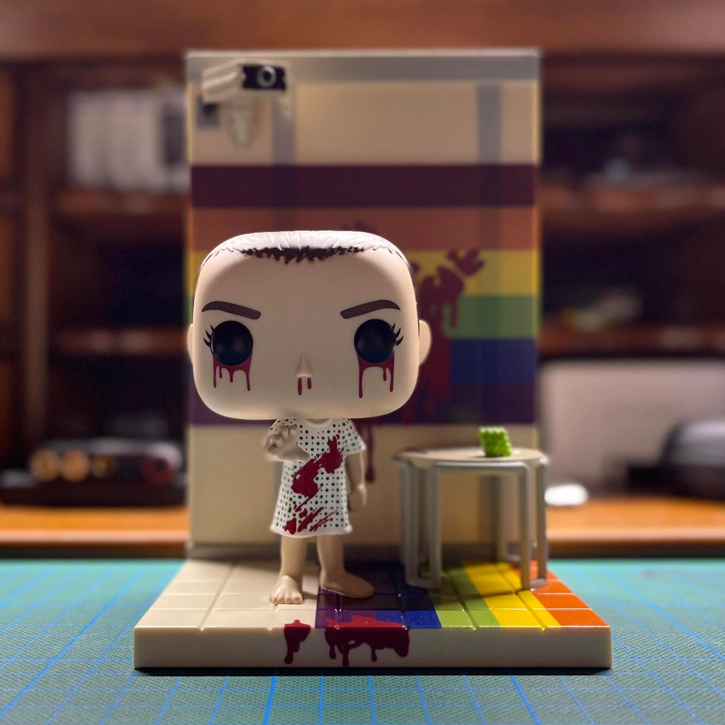 Funko POP! Deluxe: Stranger Things - Eleven in The Rainbow Room - Exclusive Vinyl Figure - #1251, Multicolor