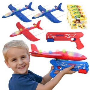 Toy Airplane Launcher - Outdoor Games - 4 Pack 17.5 Foam Glider Planes + 2 Launchers + 4 Sets of Stickers - LED Lights - Throwing Toys for Kids - Red & Blue Flying Toys – 4 5 6 7 8 Year Old Boys Girls