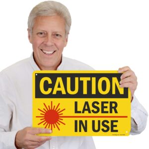 SmartSign 12 x 18 inch “Caution - Laser In Use” Sign with Pre-Cleared Holes, Digitally Printed, 55 mil HDPE Plastic, Black, Red and Yellow, Made in USA