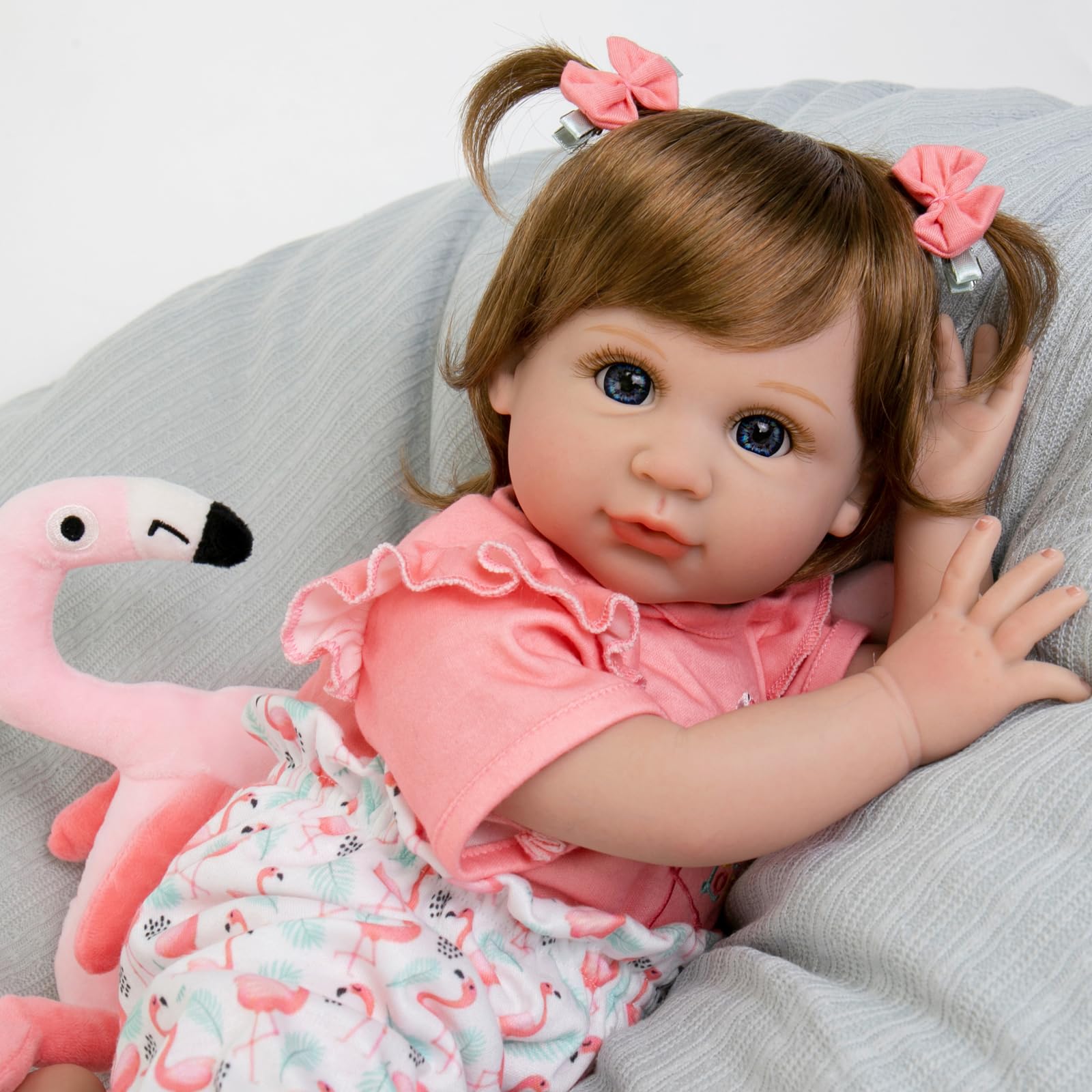 Aori Reborn Baby Girl Doll,22 in Realistic Newborn Baby Dolls,Adorable Lifelike Babies,Weighted Reborn Toddler with Flamingo Toy Gifts Set for Kids 3 Year Old