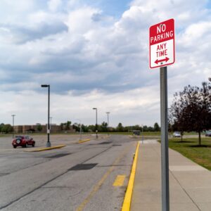 SmartSign 18 x 12 inch “No Parking - Any Time” Metal Sign with Bidirectional Arrow, 63 mil Aluminum, 3M Laminated Engineer Grade Reflective Material, Red and White, Made in USA