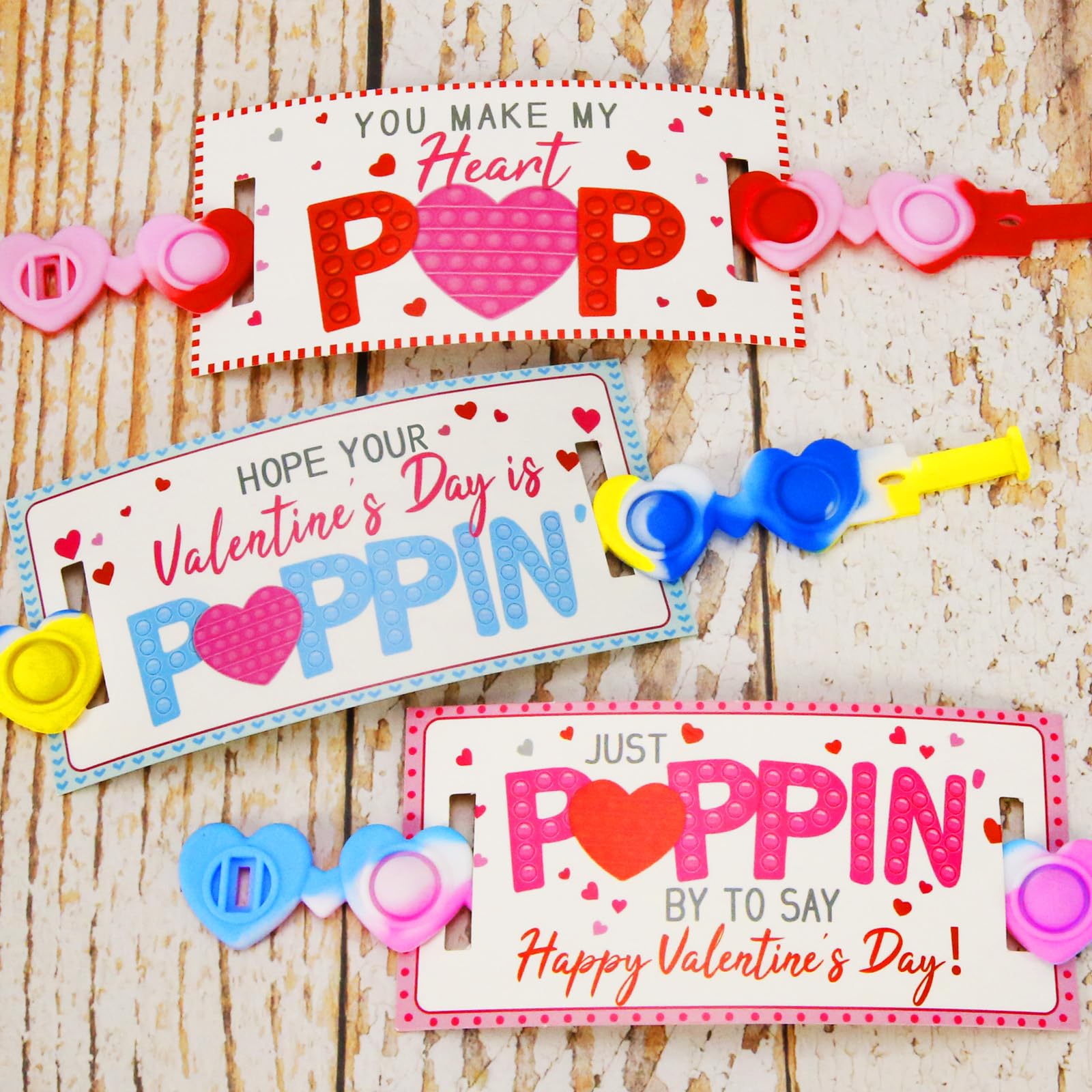 Valentines Day Gifts for Kids - 24 Pack Valentines Cards with Heart POP Bracelets - Sensory Fidget Toys Valentine for School Classroom Gift Exchange Party Favors Supplies for Toddlers Girls Boys