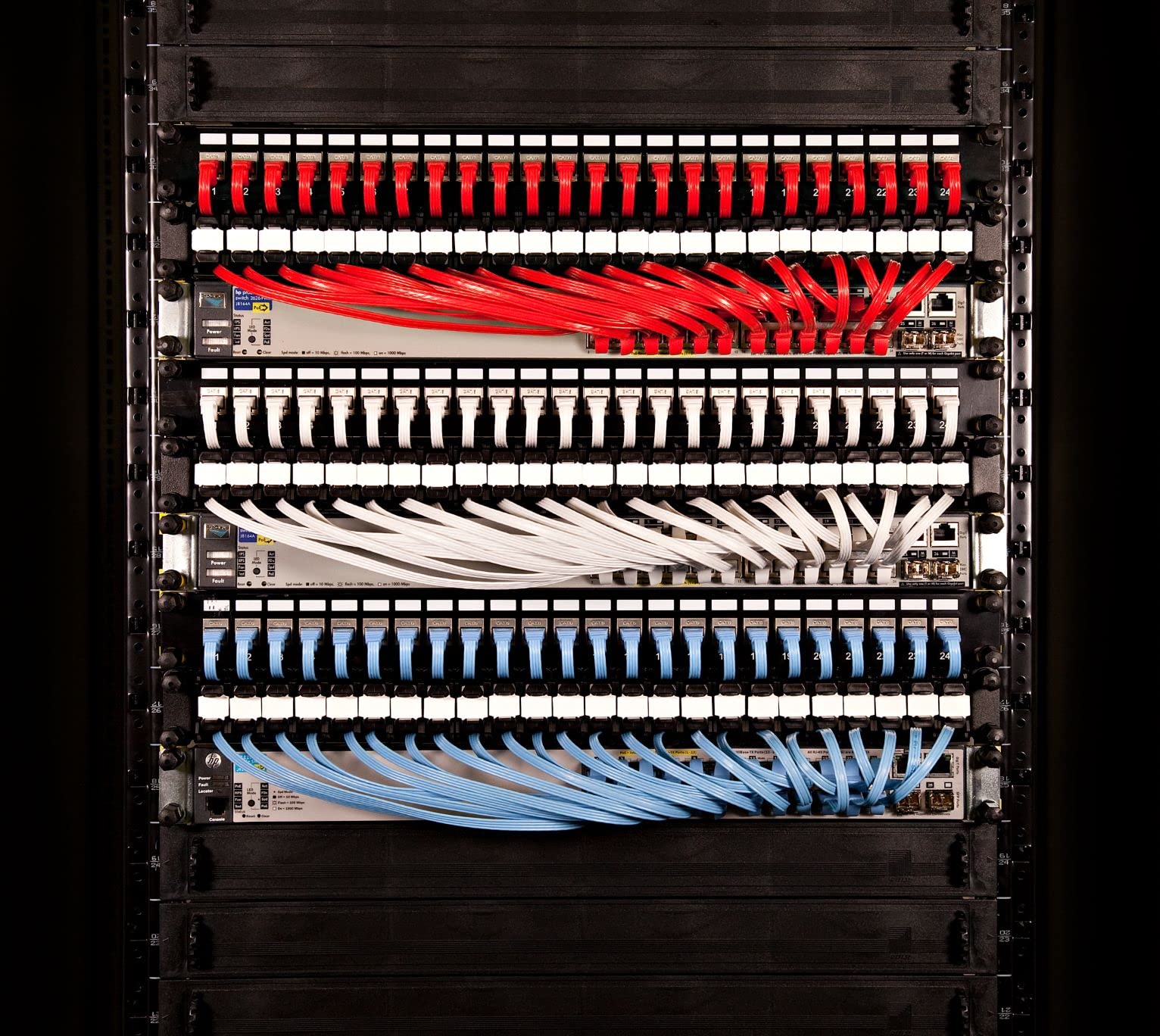 PATCHBOX® Plus+ Cat.6a - 24-Port Patch Panel with Retractable Cable Management System for 19” Racks, Includes Flat 10GB Cables and Cassettes, Easy Network and Server Setup (UTP, Blue, 1.8m / 8RU)