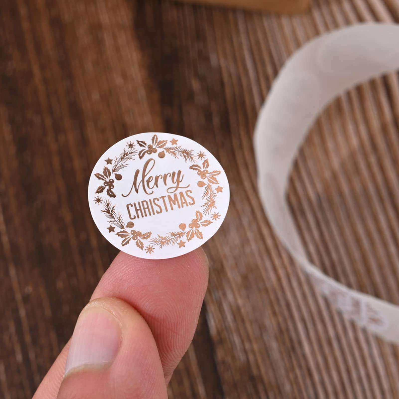 NUOMI 1000 Pcs Merry Christmas Stickers Round Adhesive Seal Labels Rose Gold Foil Stamping with Flower for Xmas Decor Cards Envelope Gift Packaging, 1 Inch