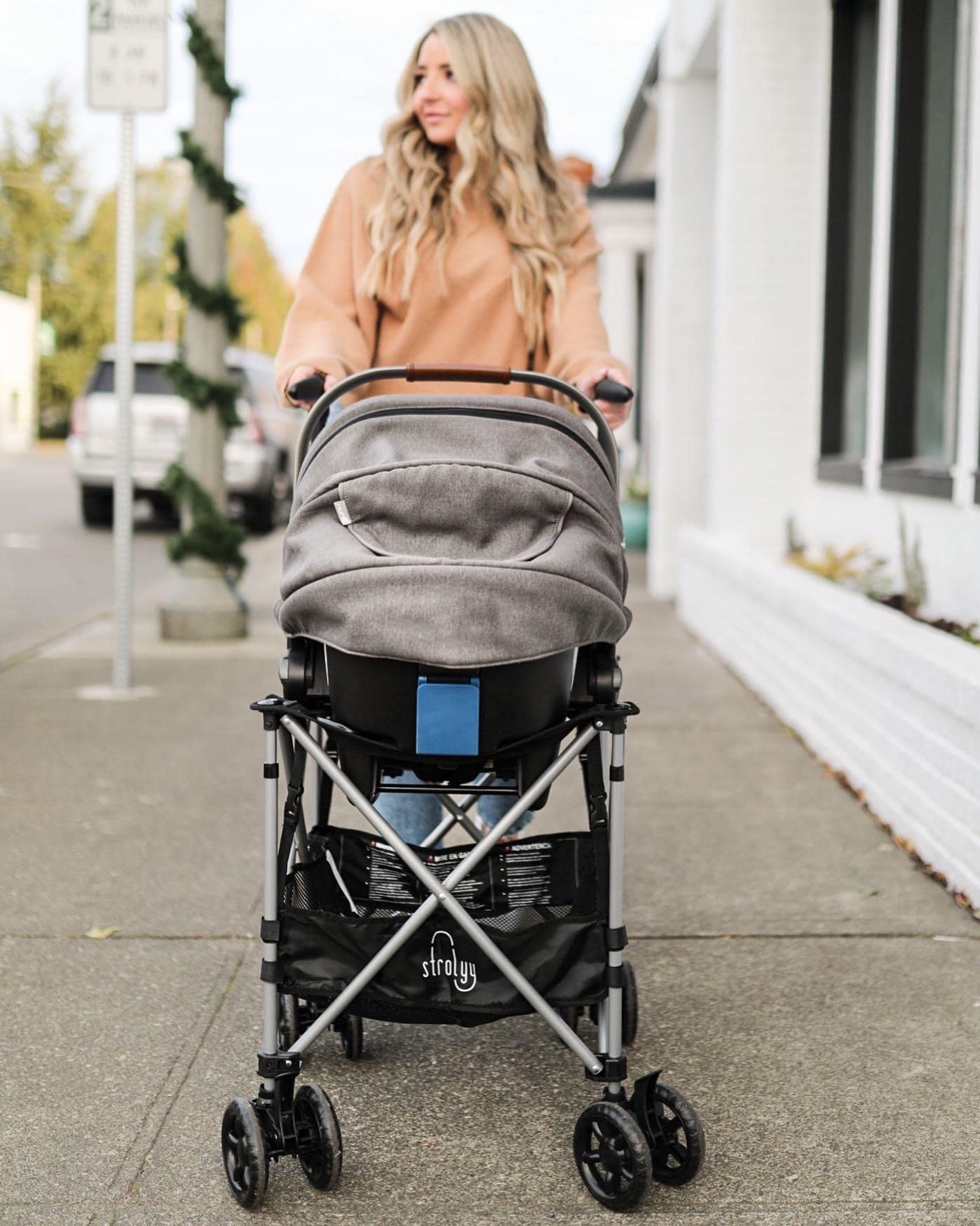 Universal Infant Car Seat Carrier. Adds Wheels to Any car seat. Compact & Lightweight. Fits Everywhere.