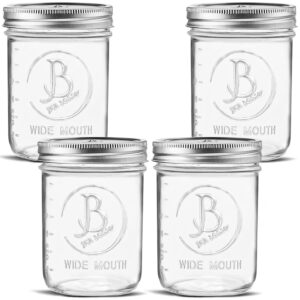 wide mouth mason jars 16 oz - (4 pack) - clear glass pint mason jars with airtight lids and bands. for storage, canning, fermenting, meal prep, overnight oats, freezing, microwave & dishwasher safe