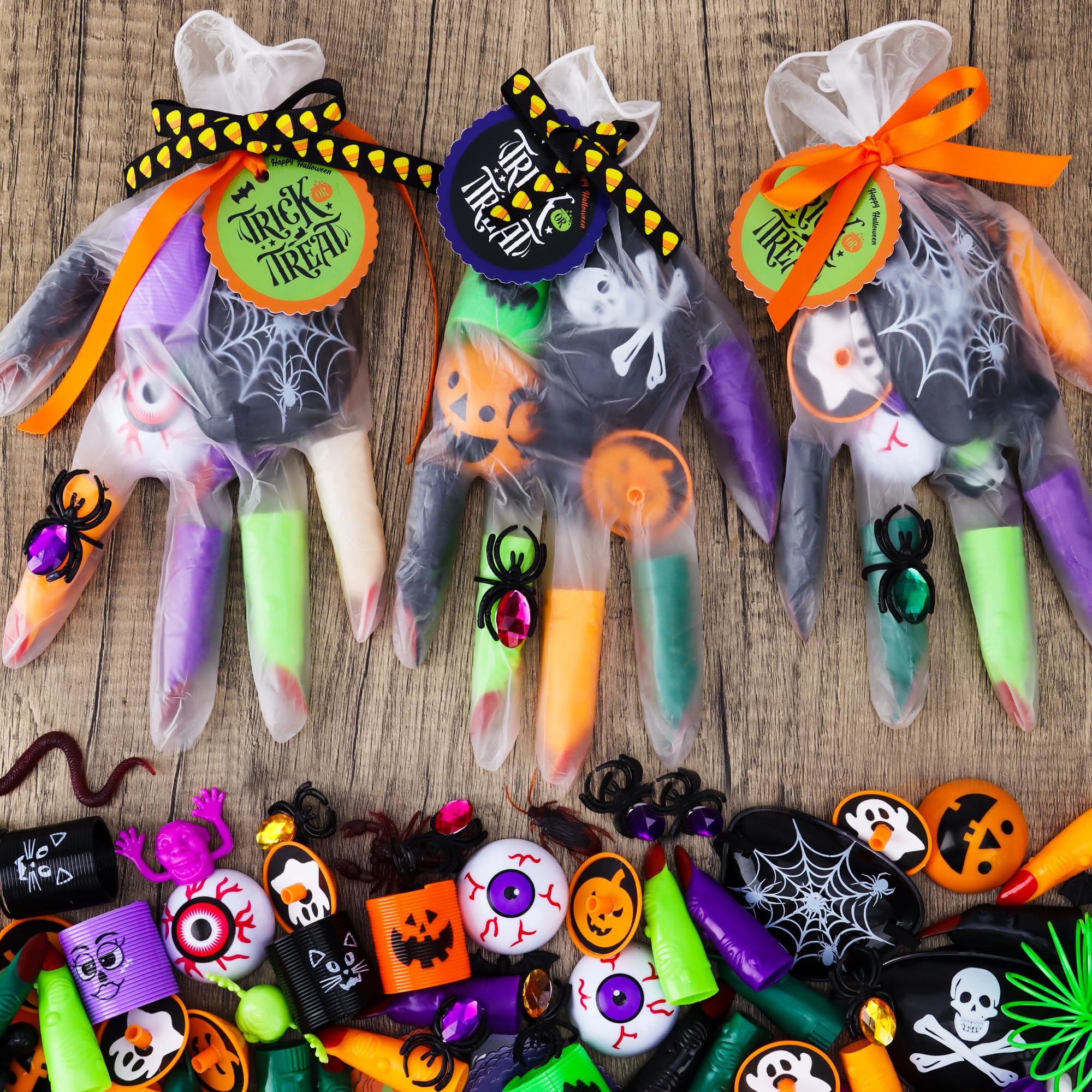 POPGIFTU Halloween Party Favors for Kids, 24 Pack (242PCS) Gloves Stuffed Toys Bulk, Non-Candy Halloween Treat Bags Fillers for Halloween Party Supplies Pinata Classroom Prizes