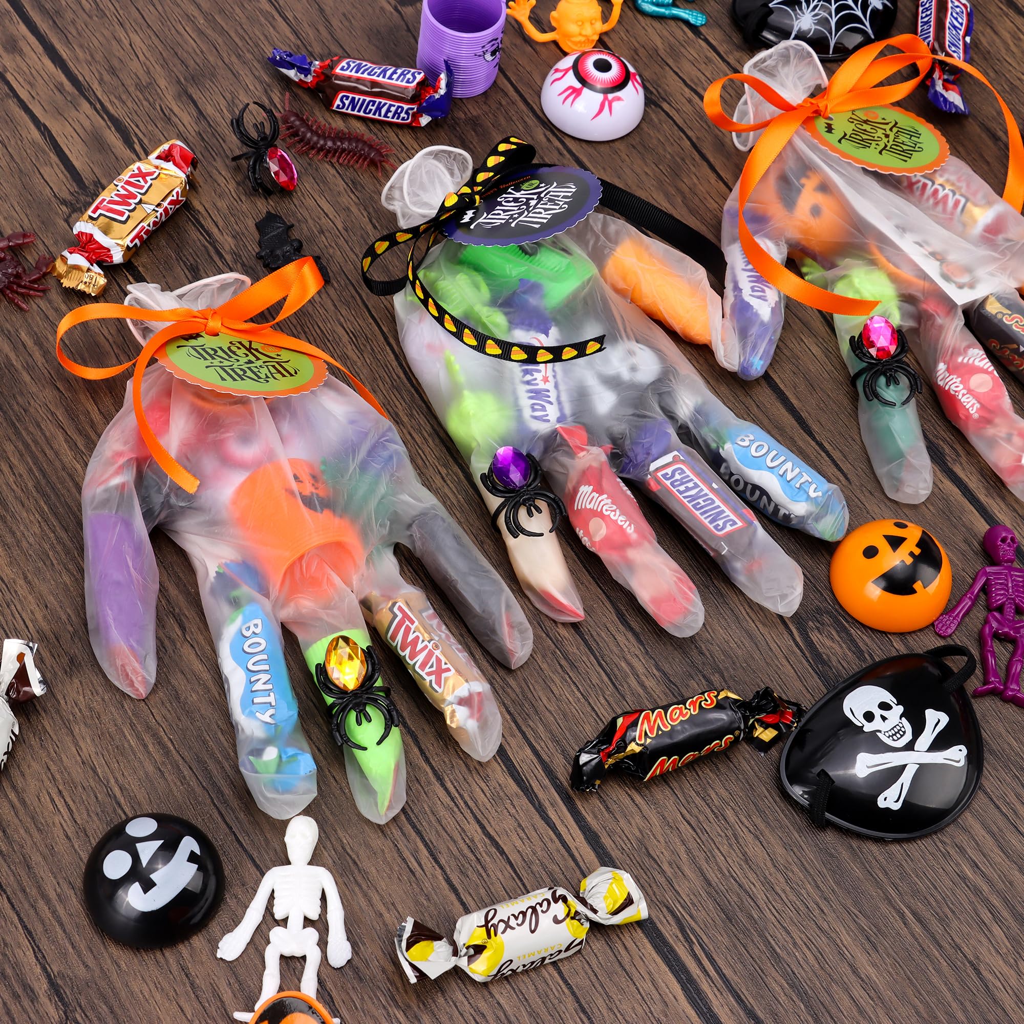 POPGIFTU Halloween Party Favors for Kids, 24 Pack (242PCS) Gloves Stuffed Toys Bulk, Non-Candy Halloween Treat Bags Fillers for Halloween Party Supplies Pinata Classroom Prizes