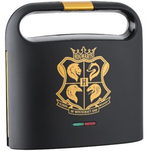 warner brothers harry potter dual sandwich maker by select brands - ceramic coated cooking plates - imprints hogwarts crest and harry potter glasses on toasted sandwiches, black and gold, wbh-100sm