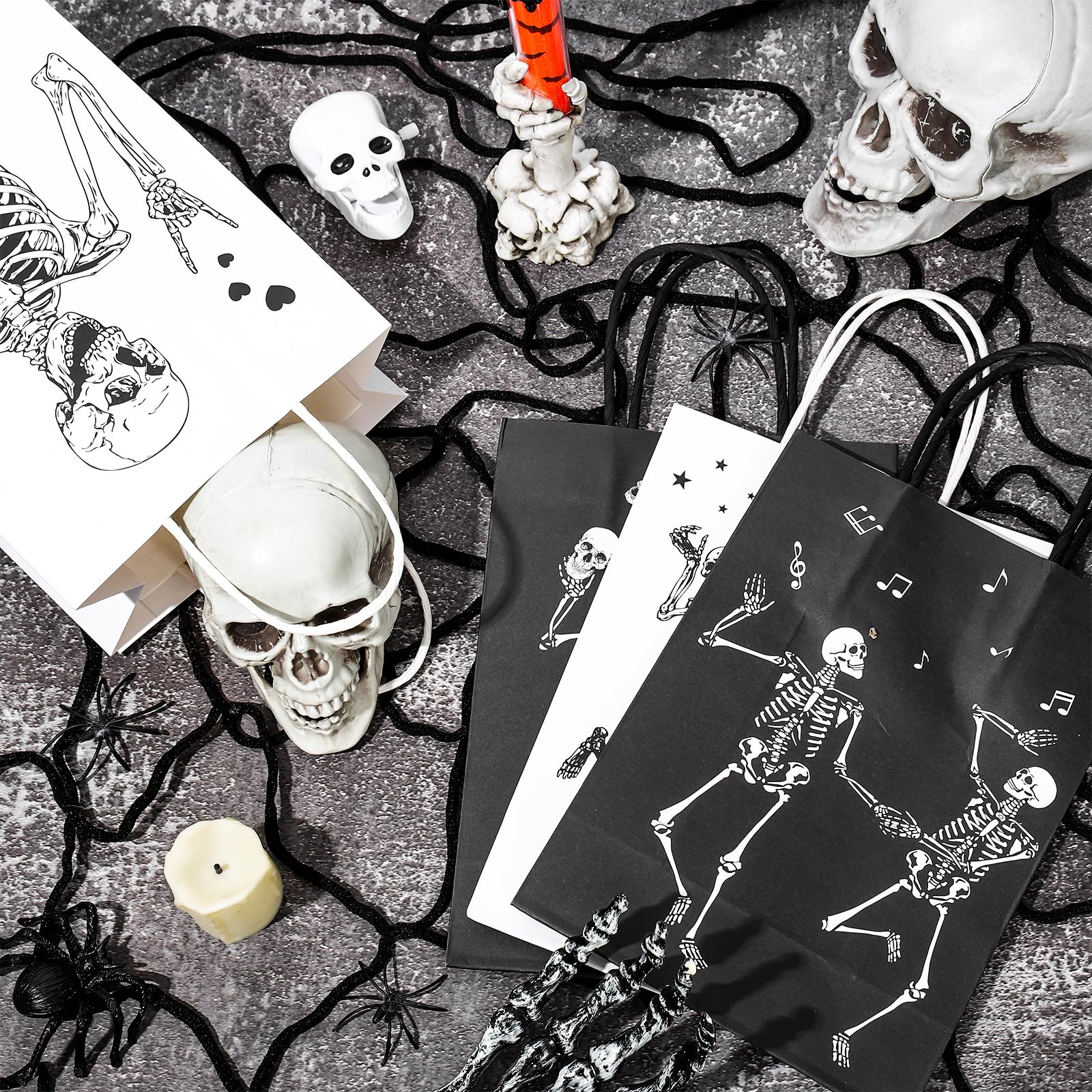 Whaline 16Pcs Halloween Skeleton Paper Gift Bags Black White Skull Party Favor Bags with Handle 4 Designs Goodie Candy Treat Bags for Halloween Party Decor Supplies