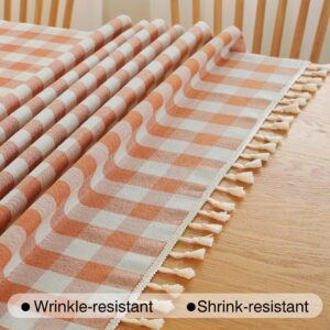 Alsoo Checkered Tablecloth Rectangle Cotton Linen Fabric Fall Gingham Table Cloth Heavy Duty Buffalo Plaid Table Cover with Tassel Washable for Kitchen Dining Holiday Party, Orange and White, 55X75''