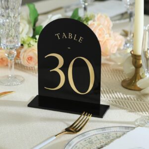 UNIQOOO Black Arch Wedding Table Numbers with Stands 1-30, Gold Foil Printed 5x7 Double Sided Acrylic Signs and Holders, Perfect for Centerpiece, Reception, Decoration, Party, Anniversary, Event