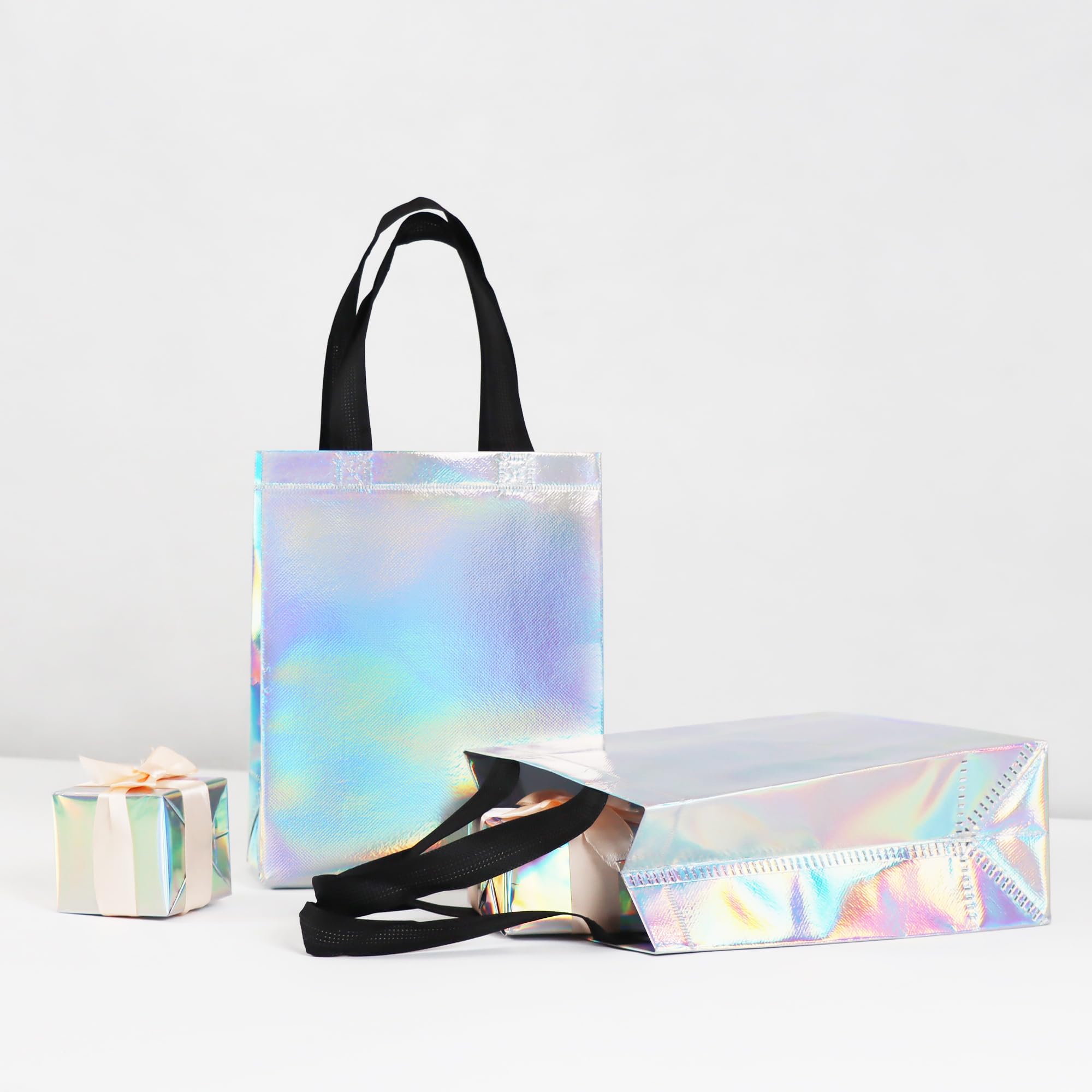 cabzymx 9 Pcs Glossy Small Iridescent Gift Bags in Bulk, 8x3.9x9.8 In Non-woven Reusable Party Goodie Bags with Sturdy Bases for Birthday, Weddings, Holiday, Easter, Party