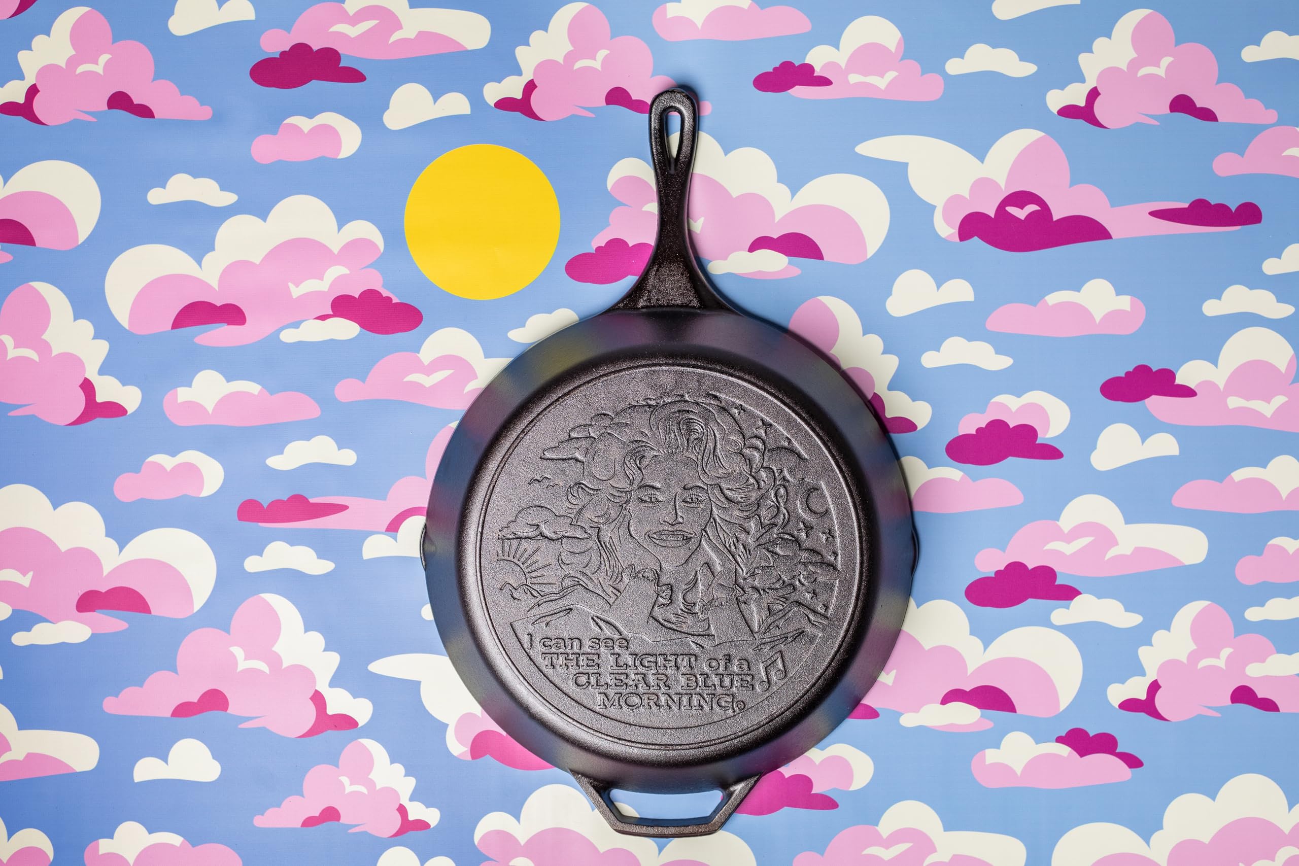 Lodge 13.25 Inch Dolly Parton Pre-Seasoned Cast Iron Stamped Skillet - Signature Teardrop Handle - Use in the Oven, on the Stove, on the Grill, or Over a Campfire - Clear Blue Morning