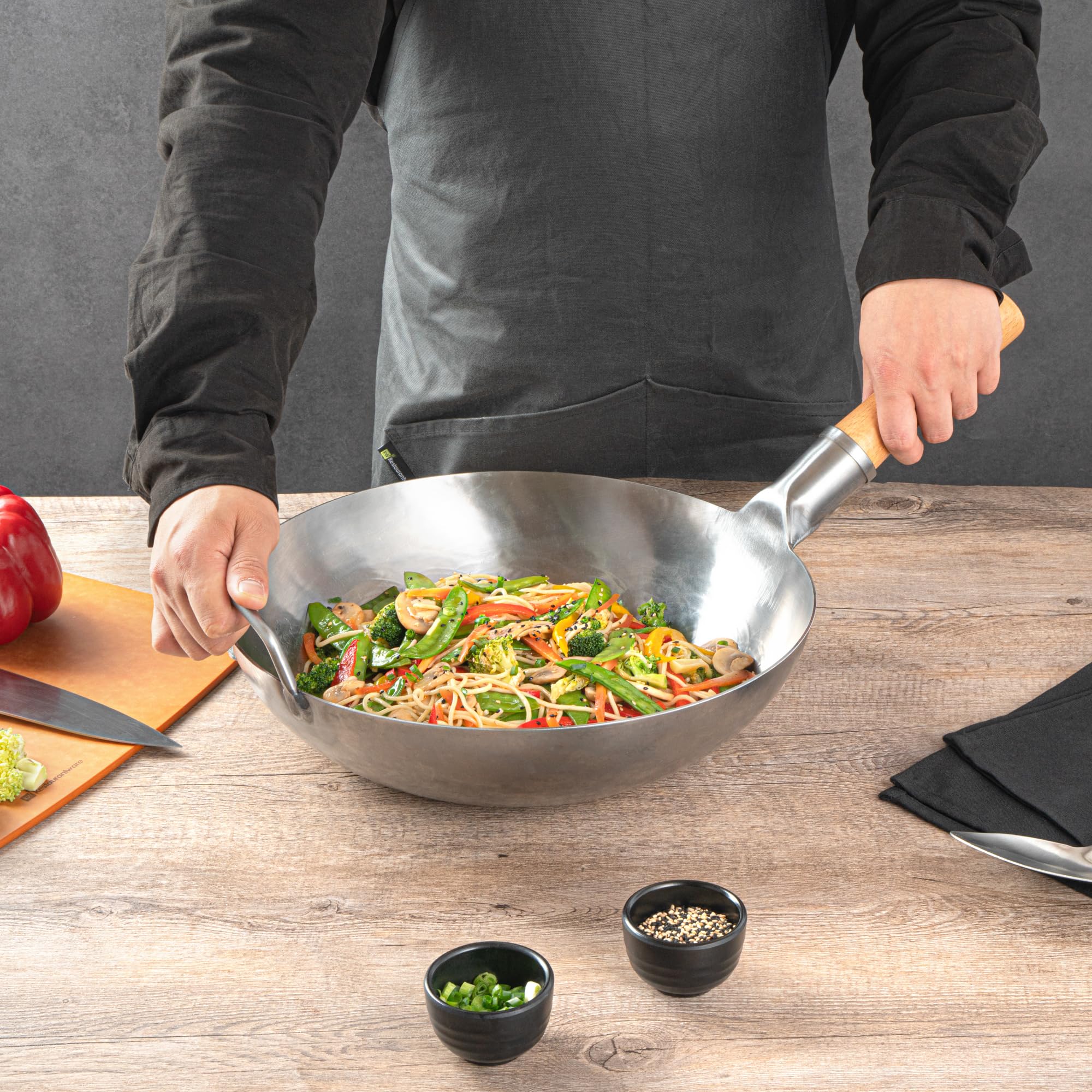 Restaurantware-Motomori 13.38 Inch Hand-Hammered Carbon Steel Wok, 10 Traditional Japanese Wok - Flat Bottom, Wooden Handle, Black Carbon Steel Traditional Stir Fry Pan, With Helper Handle