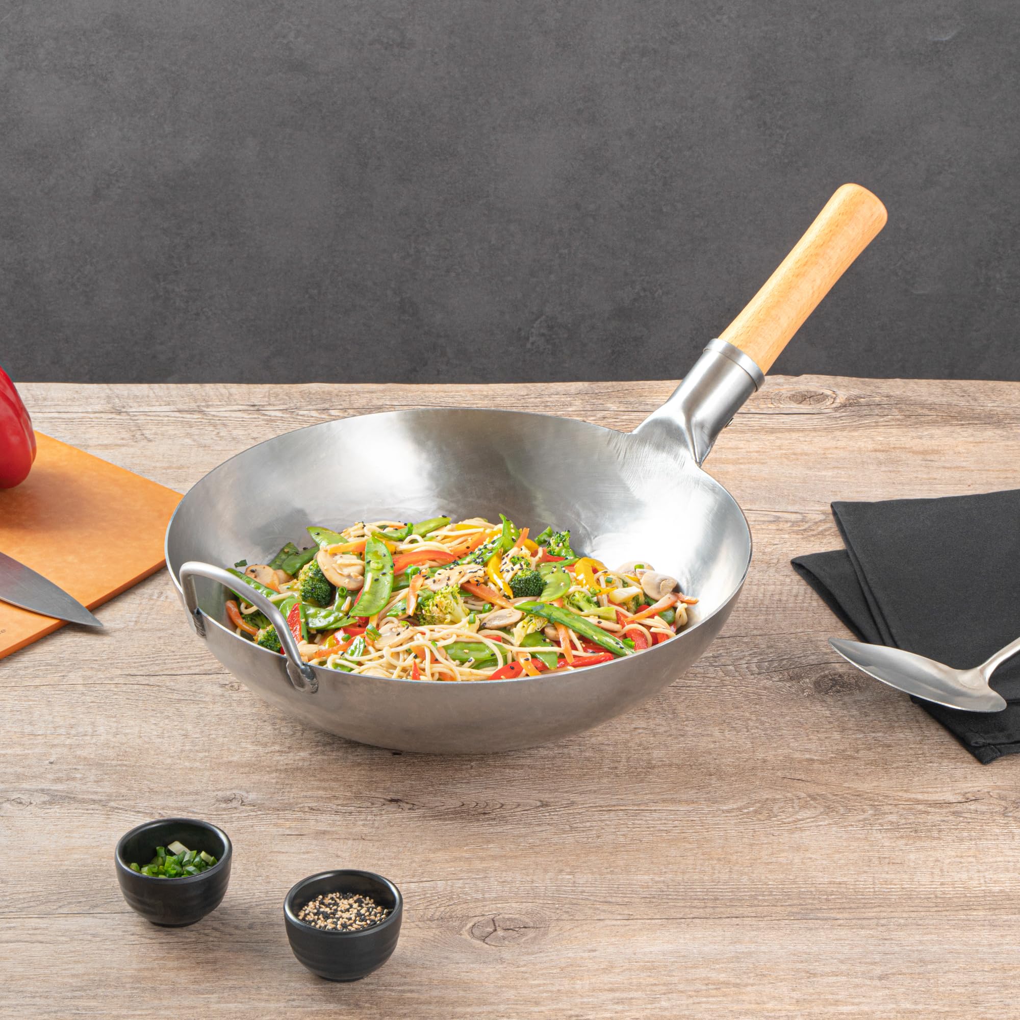 Restaurantware-Motomori 13.38 Inch Hand-Hammered Carbon Steel Wok, 10 Traditional Japanese Wok - Flat Bottom, Wooden Handle, Black Carbon Steel Traditional Stir Fry Pan, With Helper Handle