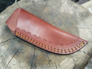 generic leather sheath with hand stitching, brown