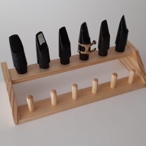 Saxophone mouthpiece wooden stand holder rack for 12 mouthpieces.