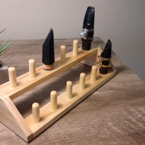 Saxophone mouthpiece wooden stand holder rack for 12 mouthpieces.