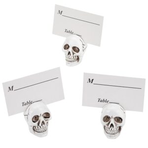 ahandmaker 3 pcs skull table card holder clip for cards on the table top resin skull table number holder, spooky desktop for party graveyard halloween decoration