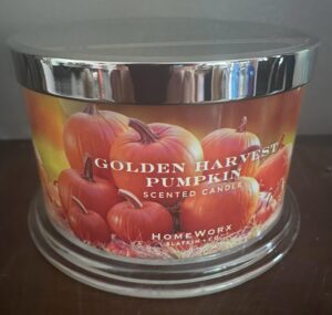 homeworx golden harvest pumpkin 4 wick 18 oz candle notes of whipped pumpkin, fresh cardamom, spiced maple rum, cinnamon vanilla, marshmellow