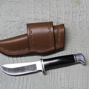 CARL THOMAS LEATHERS Crossdraw knife sheath. quality leather quality stitching. fix blade Nylon stitching. may defeat a 103. Knife holder.