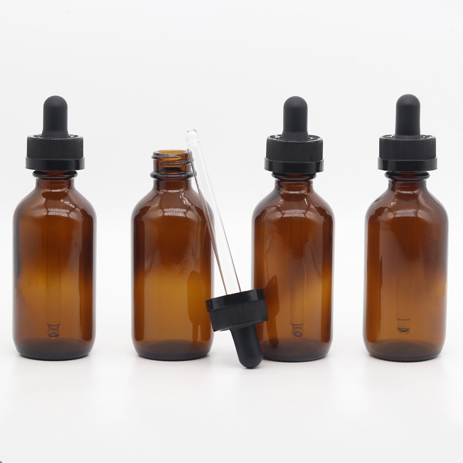 Toaazhy 4 pack,amber glass dropper bottles 2 oz,60 ml dark empty tincture bottles with dropper,alcohol,hair oil bottle,perfume,essentia,small,eye,droppers for oils,medicine,pipette,drip drop,travel