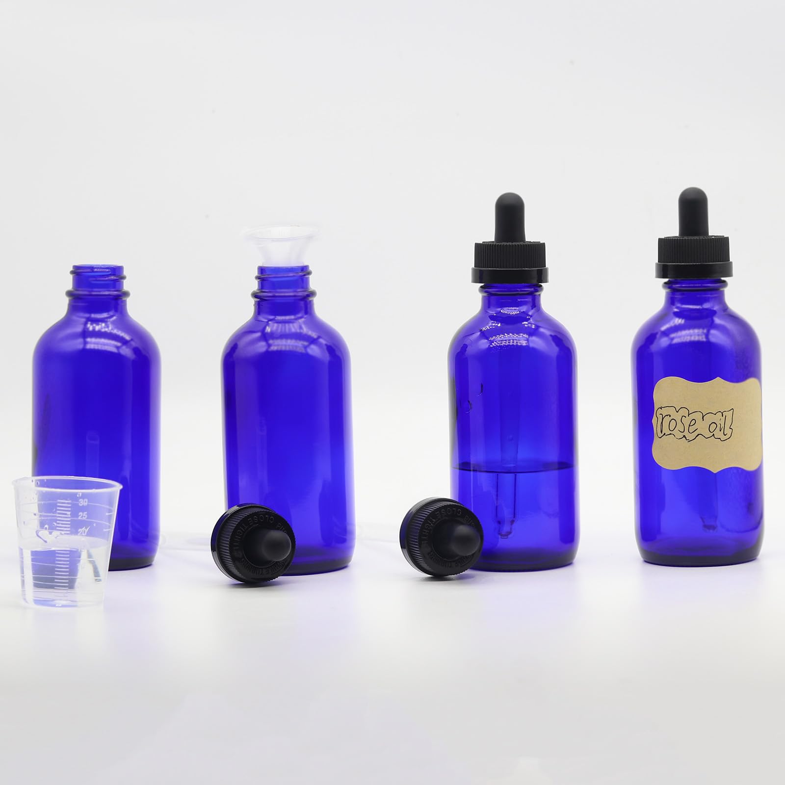 Toaazhy 4 pack,blue eye glass dropper bottles 4 oz,120 ml dark empty tincture bottles with dropper,alcohol,hair oil bottle,perfume,essentia,small,droppers for oils,medicine,pipette,drip drop,travel