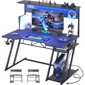 gaming computer desk with shelves and outlets, gaming desk with hutch and led lights, reversible pc gaming desk with pegboard, carbon fiber black 47''