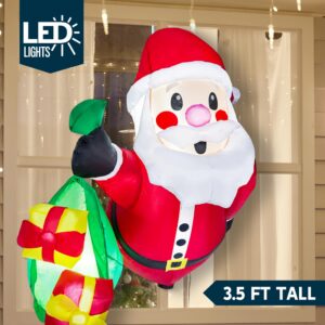 Joiedomi 3.5 FT Tall Christmas Inflatable Santa with Gift Bags Broke Out from Window, Blow Up Inflatable with Build-in LED for Window Decor, Xmas Party Indoor, Outdoor, Yard, Garden, Lawn Decoration