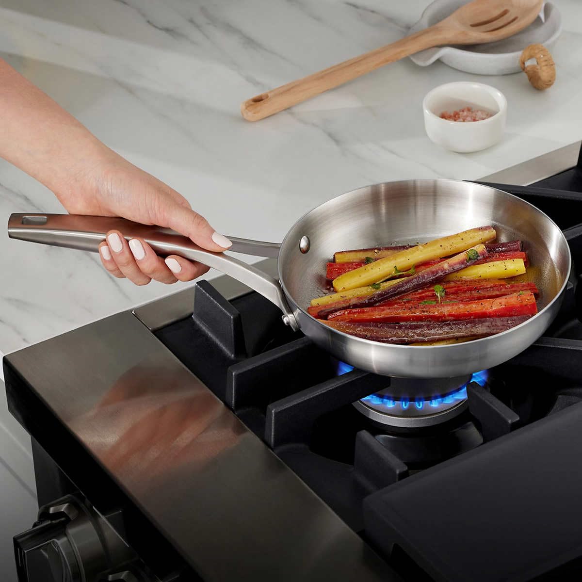 Calphalon Premier Stainless steel superior even heating. 3 Ply metal construction, Ergonomic Handles stay cool. Oven, Gas, Electric, Glass top, and Induction safe.