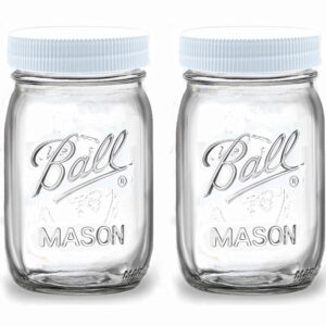 Regular Mouth Mason Jars 16 oz - (2 Pack) - Ball Regular Mouth 16-Ounces Pint Mason Jars with White M.E.M Food Storage Plastic Lids - For Storage, Freezing - Leak Proof, Microwave & Diswasher Safe