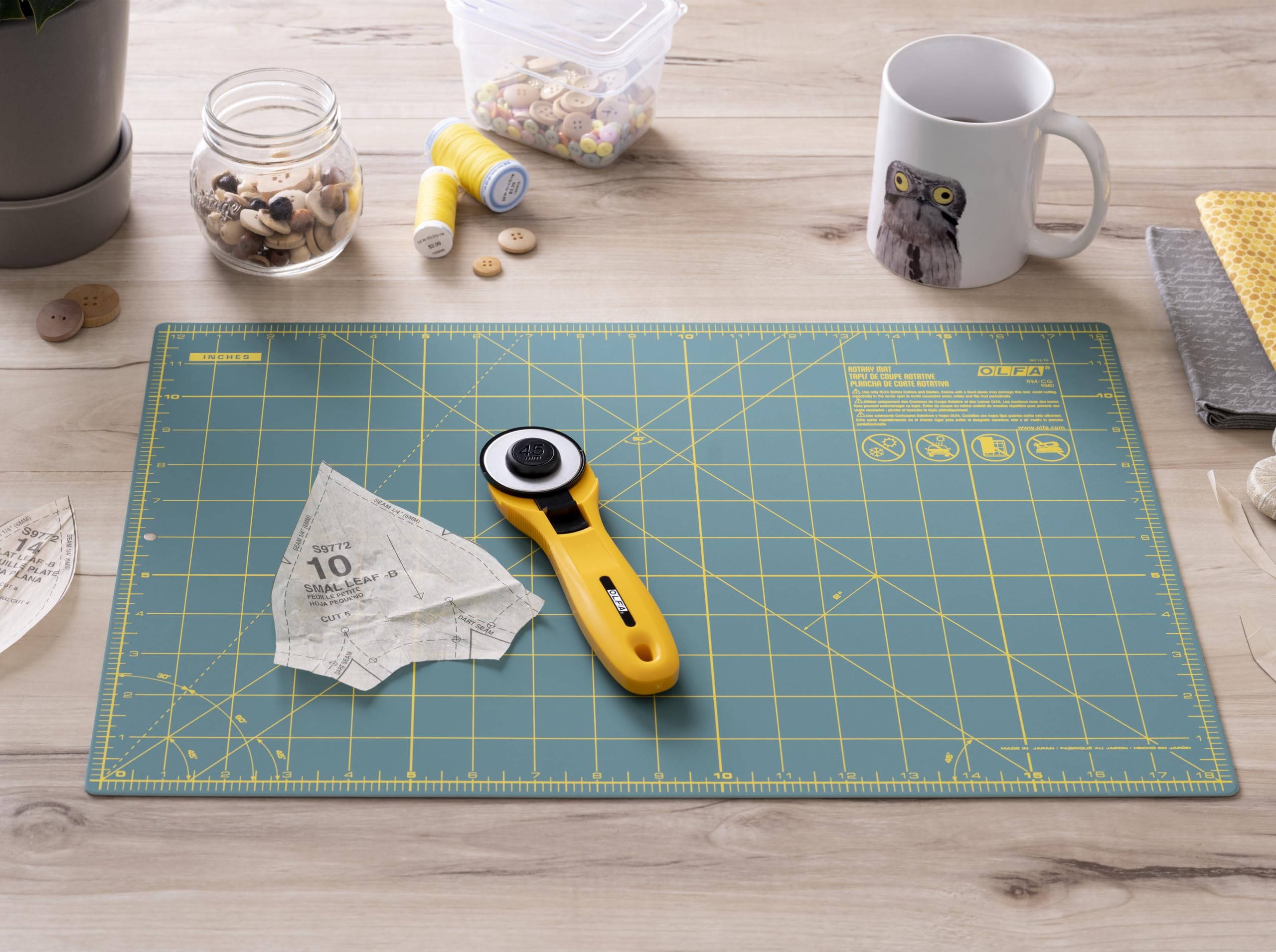 OLFA Fabric Cutting Kit (RTY-2CYEL/ST-01) - 12" x 18" Self Healing Rotary Cutting Mat (ST-01) and 45mm Yellow Quick-Change Rotary Cutter (RTY-2/CYEL)